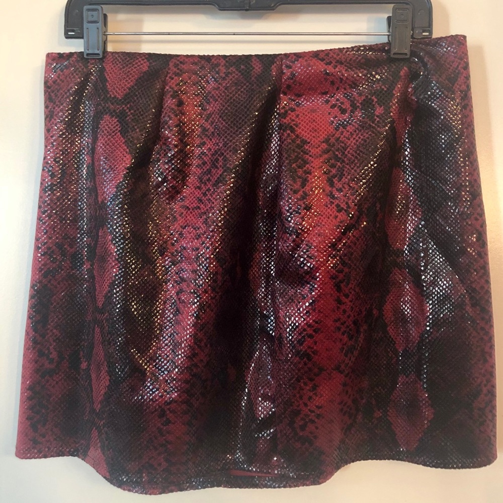 Red “wet look” snake skin print skirt